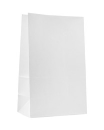 Photo of New open paper bag isolated on white