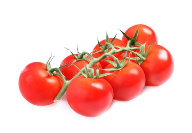 Photo of Branch of fresh cherry tomatoes isolated on white