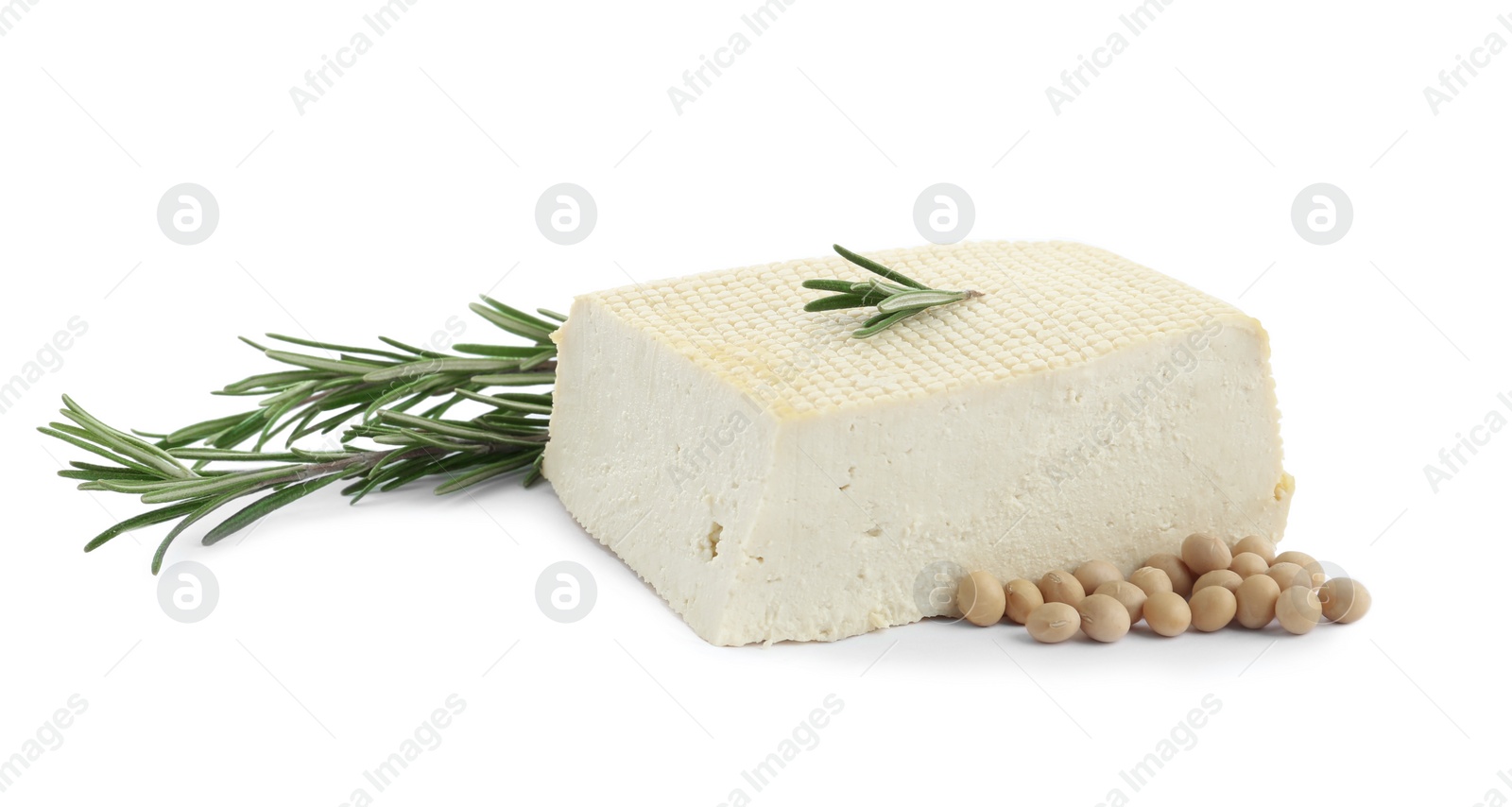 Photo of Piece of delicious tofu with rosemary and soy on white background
