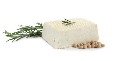 Piece of delicious tofu with rosemary and soy on white background