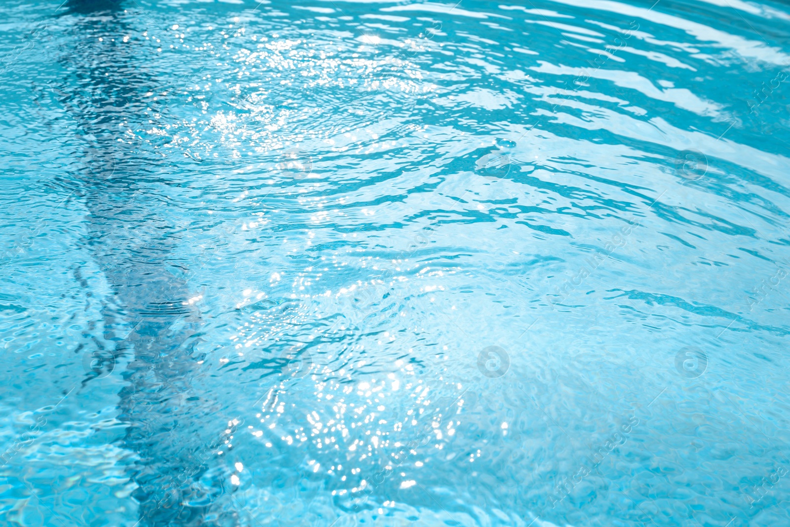 Photo of Outdoor swimming pool with clear rippled water