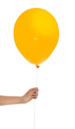 Woman holding orange balloon on white background. Halloween party