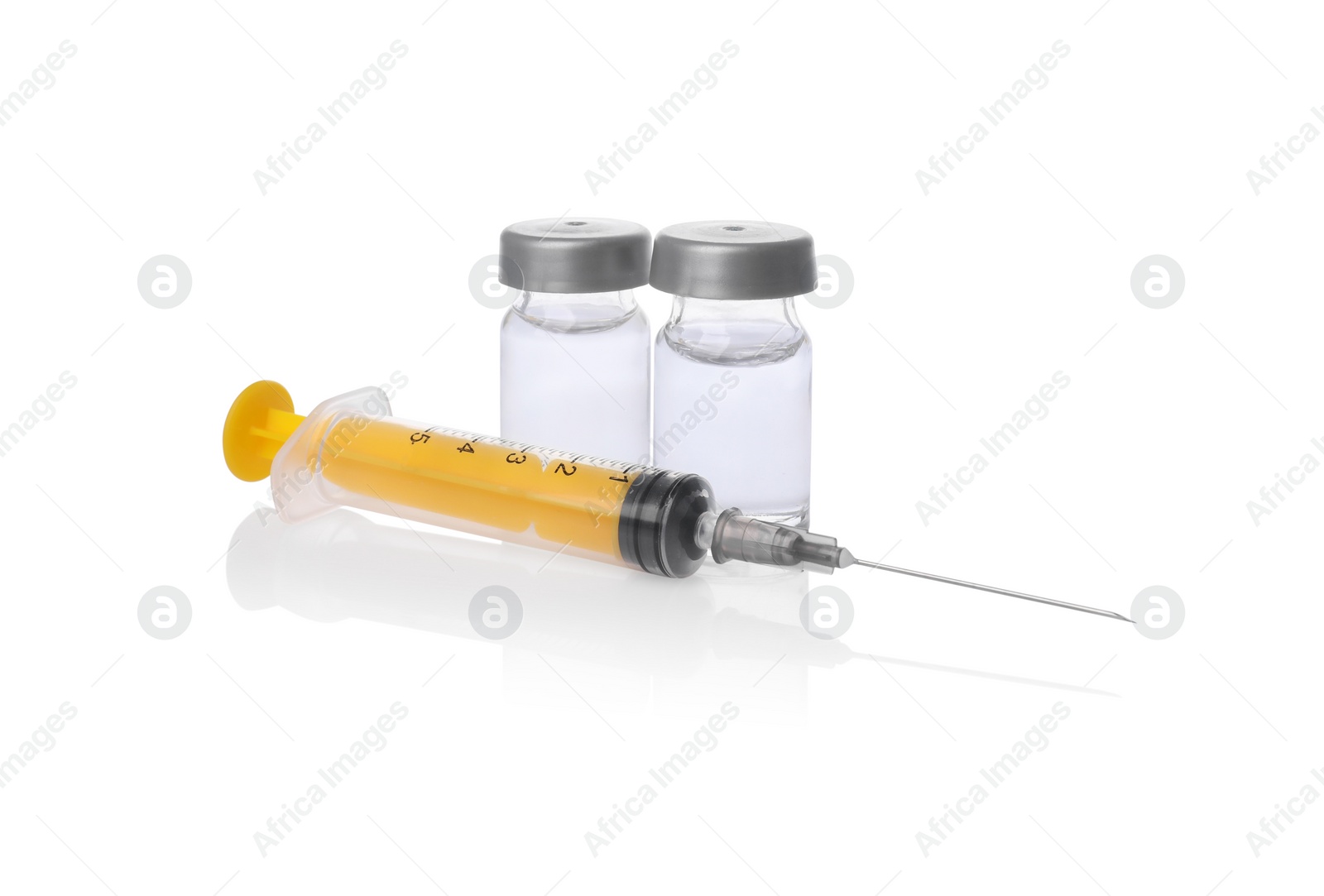 Photo of Disposable syringe with needle and vials isolated on white
