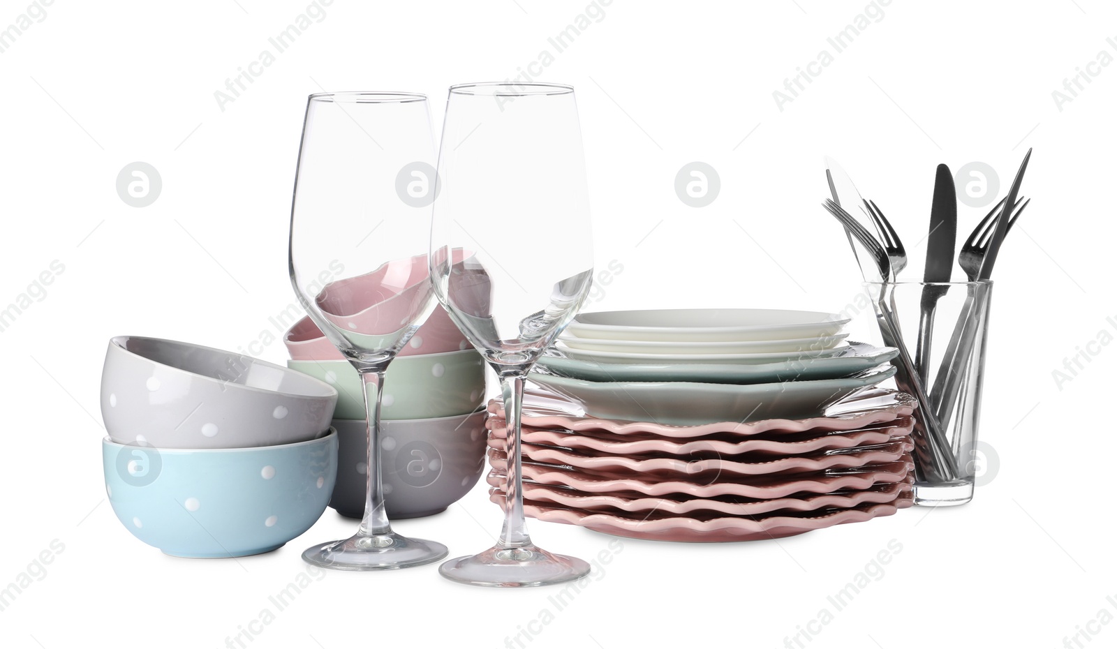 Photo of Set of beautiful ceramic dishware, glasses and cutlery isolated on white