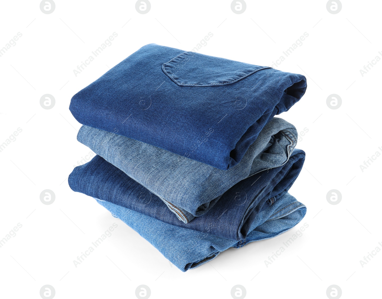 Photo of Stack of different jeans isolated on white