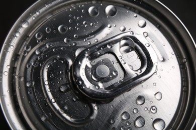 Energy drink in wet can, closeup. Functional beverage