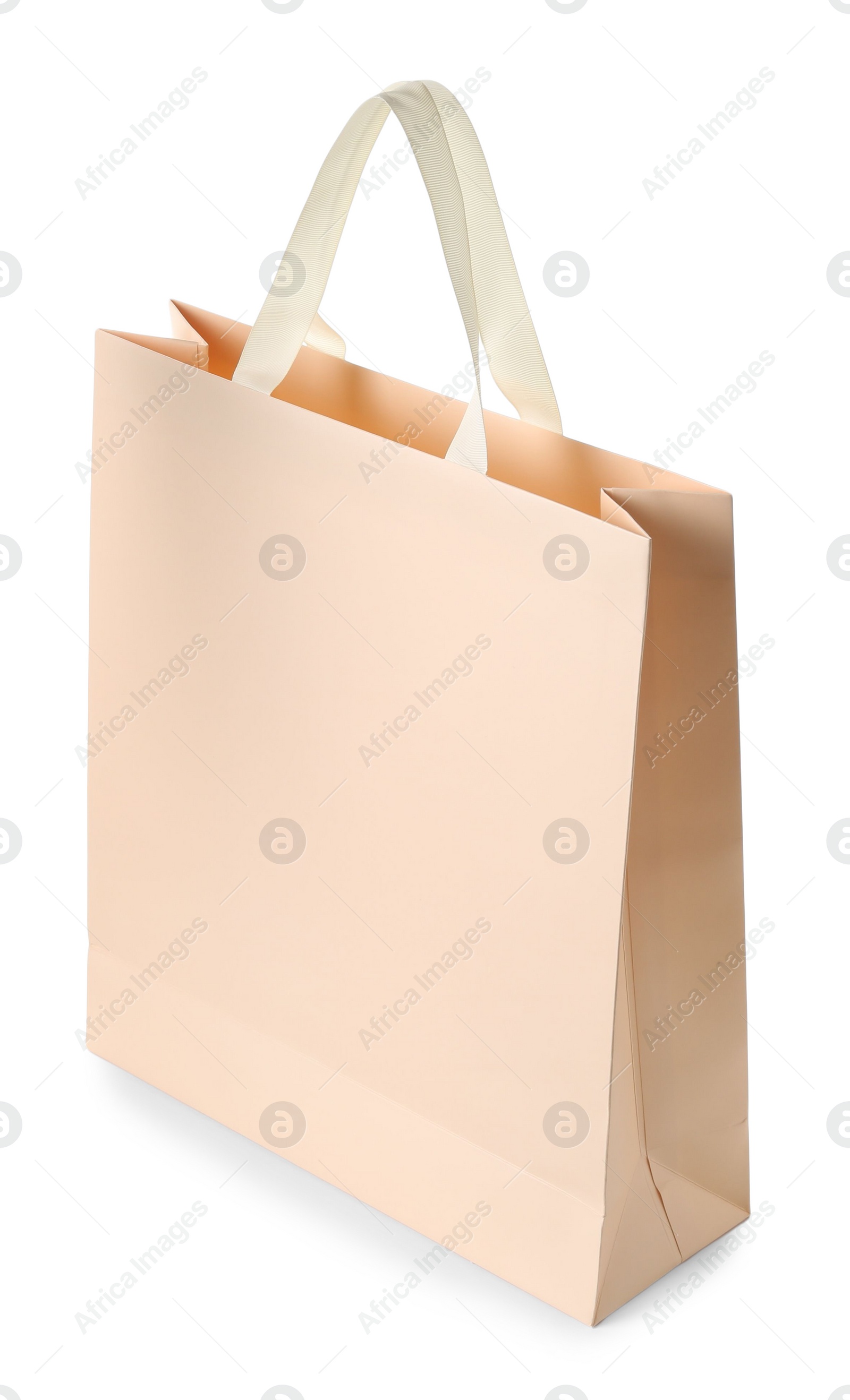 Photo of One paper bag isolated on white. Mockup for design