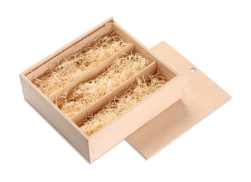 Open wooden wine box with straw isolated on white