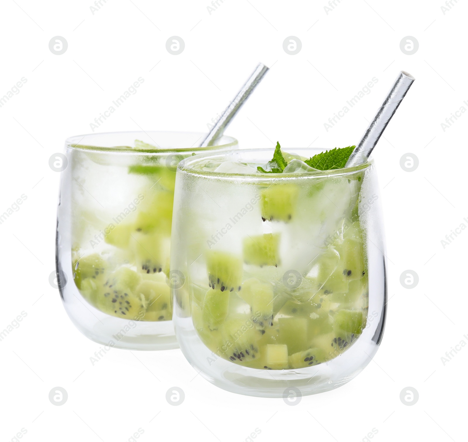 Photo of Glasses of refreshing drink with kiwi isolated on white