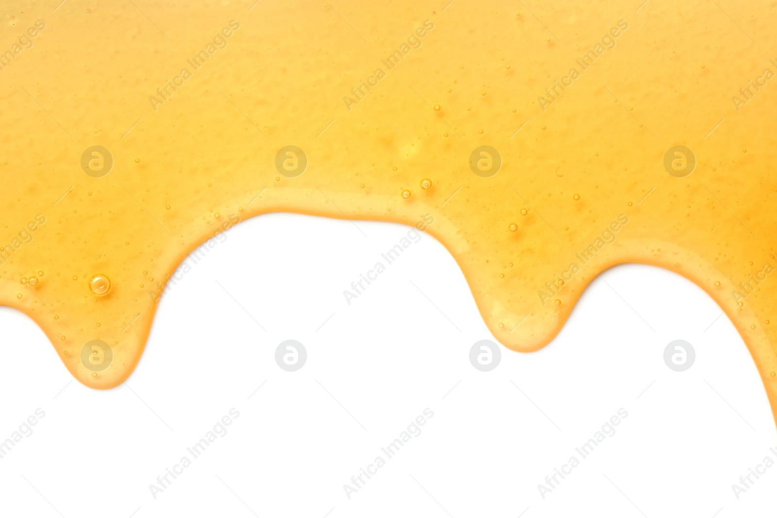 Photo of Tasty natural honey drips isolated on white, top view