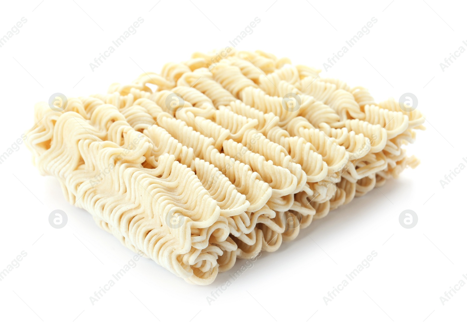 Photo of Block of quick cooking noodles isolated on white