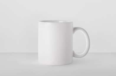 Image of Blank ceramic mug on white background. Mockup for design