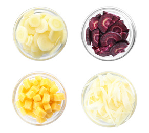 Set with pieces of different carrots in bowls on white background