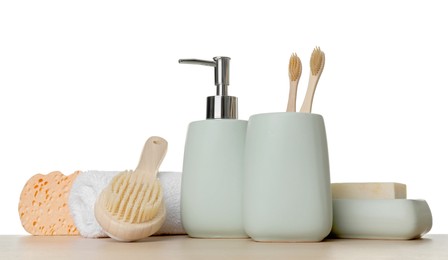 Bath accessories. Different personal care products on wooden table against white background