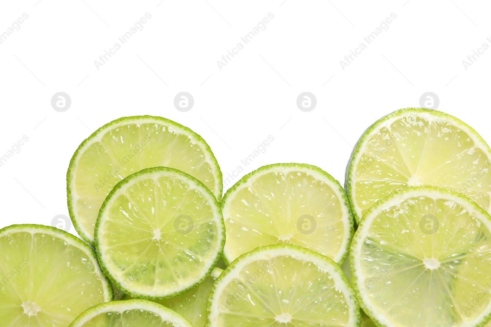 Photo of Juicy lime slices on white background, top view. Citrus fruit