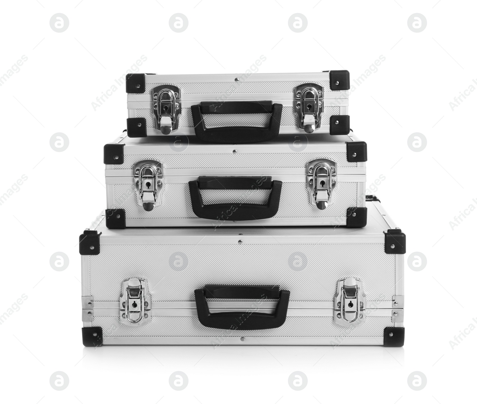 Photo of Set of modern suitcases on white background