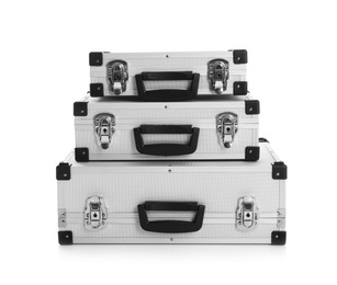 Photo of Set of modern suitcases on white background