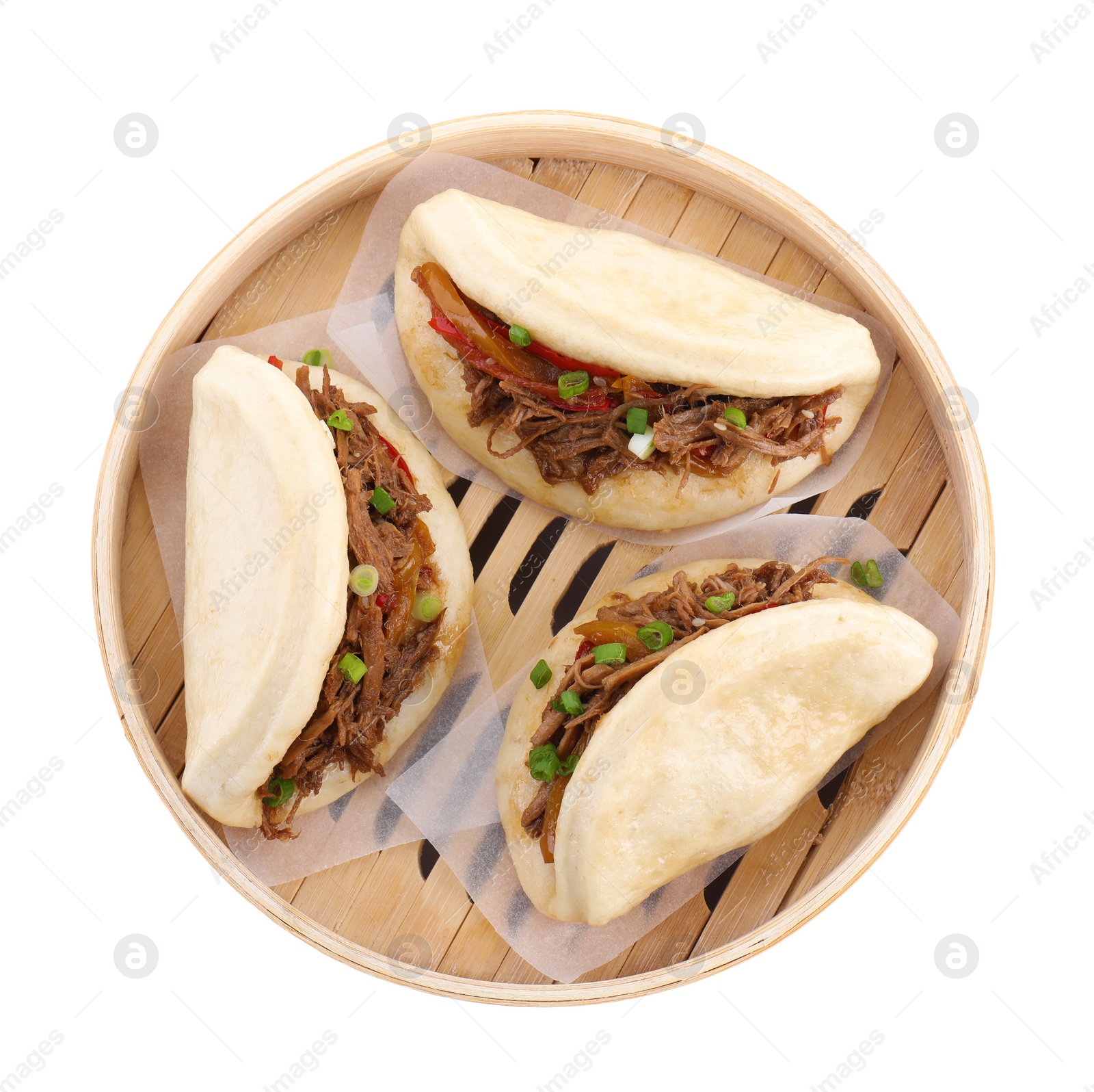 Photo of Delicious gua bao in bamboo steamer isolated on white, top view