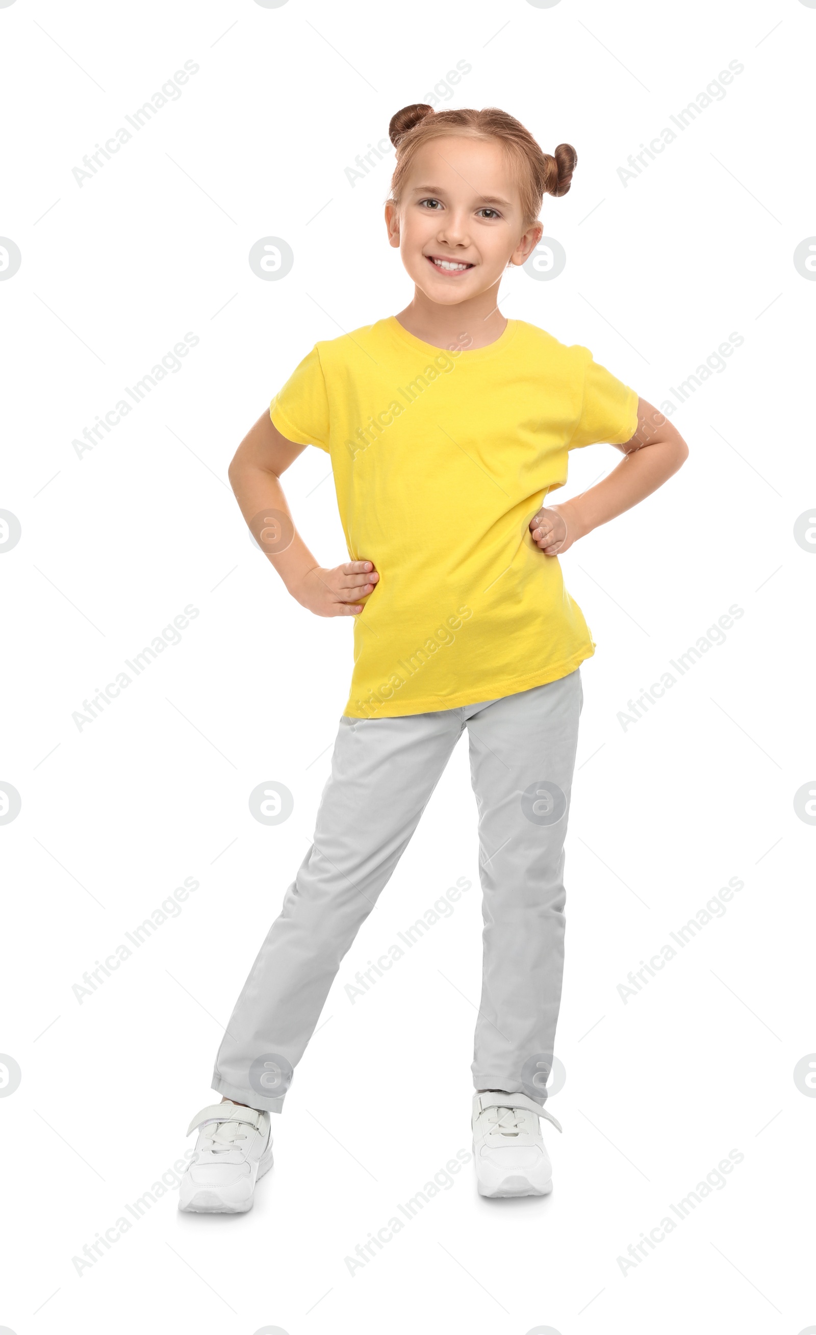 Photo of Cute little girl posing on white background