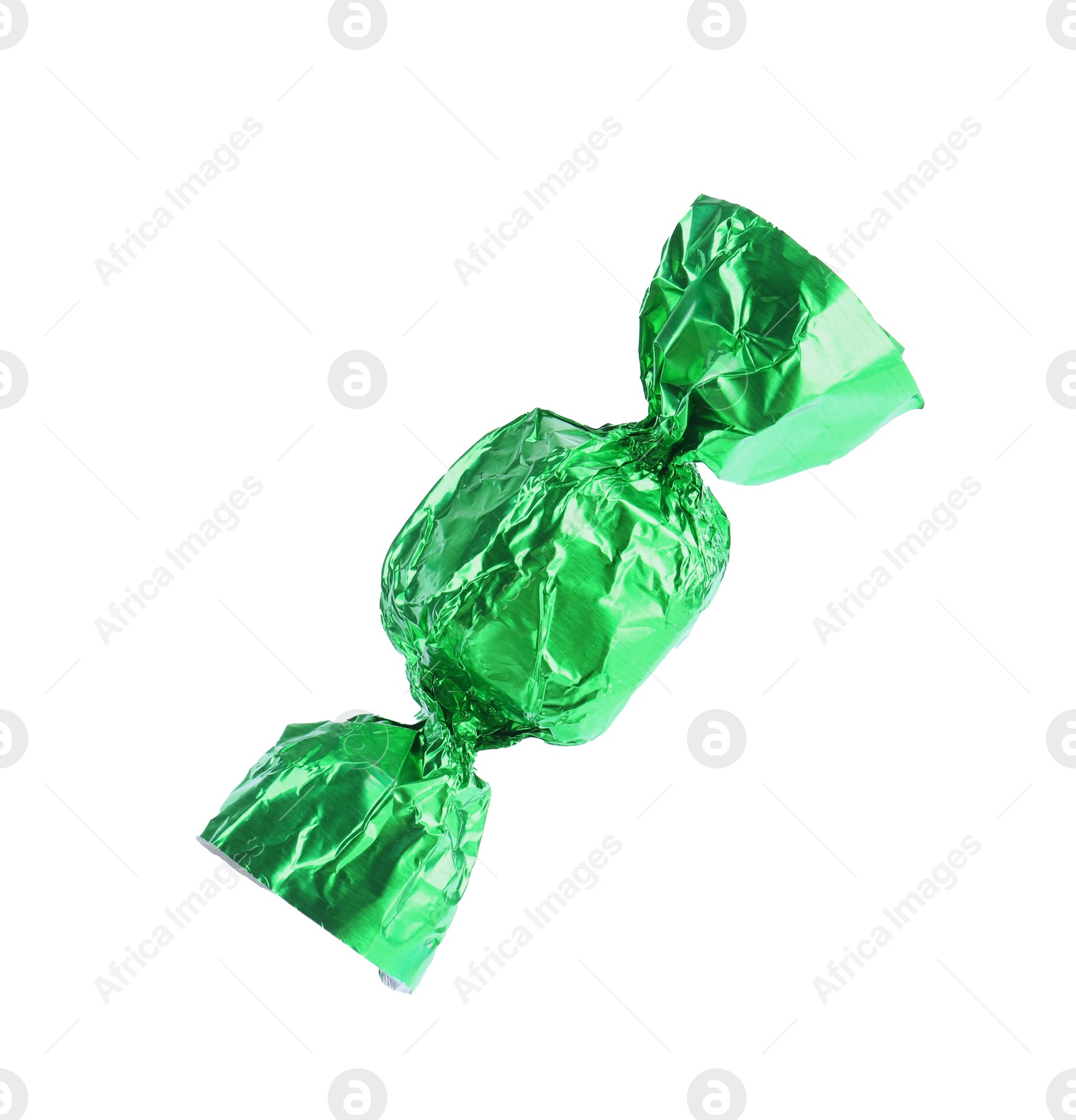 Photo of Tasty candy in green wrapper isolated on white