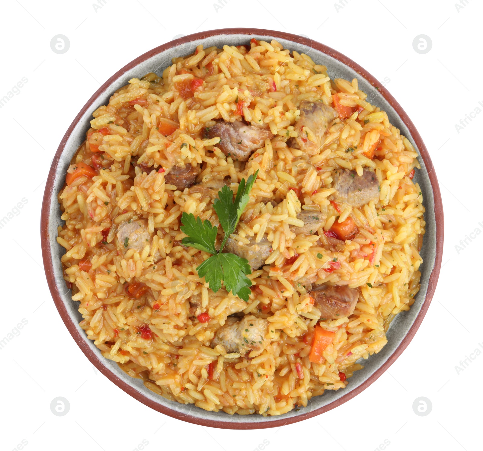 Photo of Delicious pilaf with meat isolated on white, top view