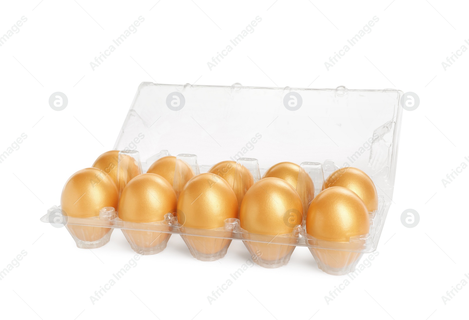 Photo of Many shiny golden eggs in plastic container on white background