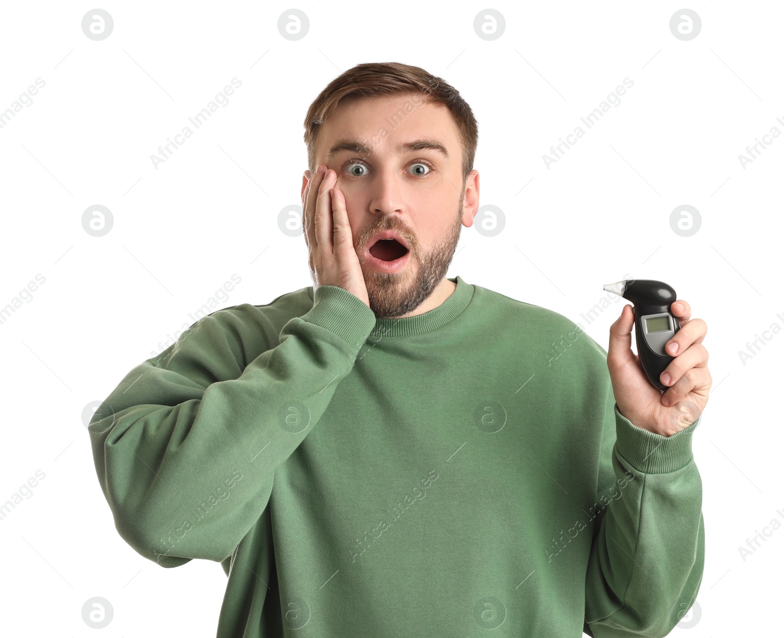 Photo of Emotional man with breathalyzer on white background