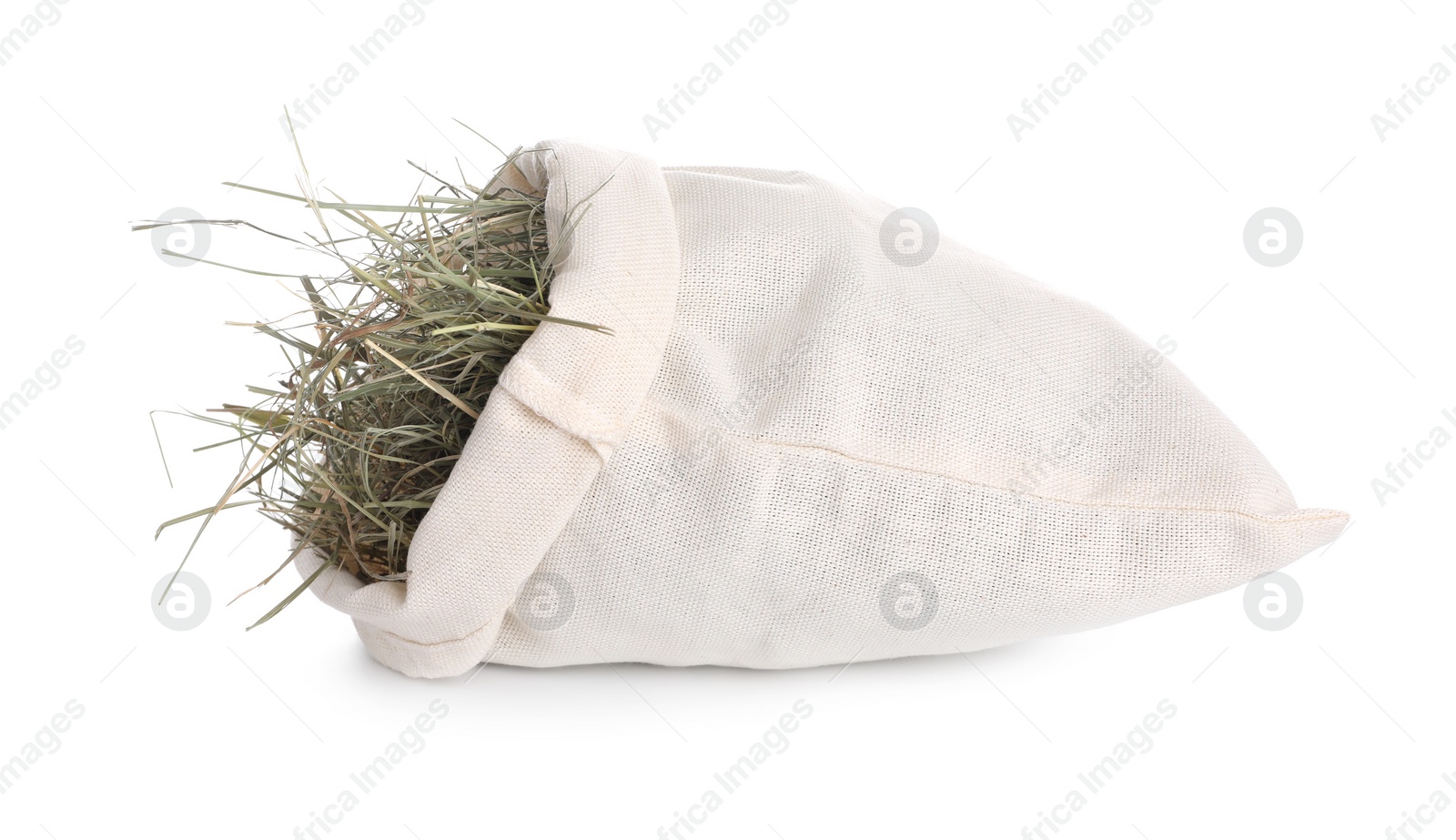 Photo of Dried hay in burlap sack isolated on white