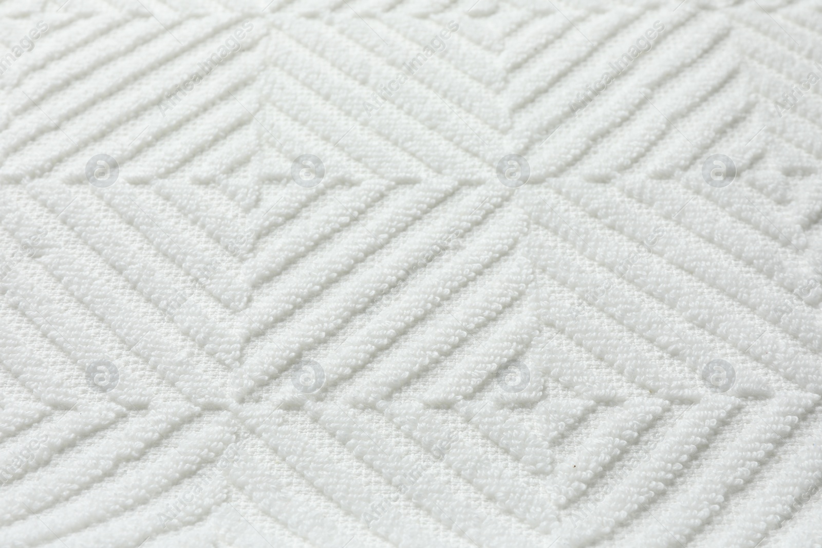 Photo of Texture of white fabric as background, closeup