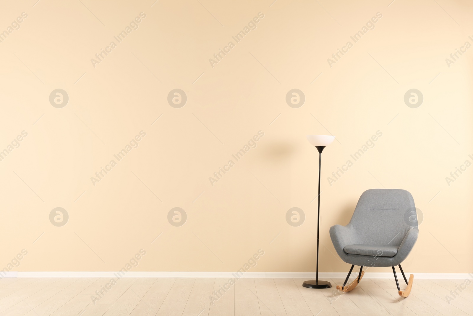 Photo of Stylish living room interior with comfortable armchair and space for text