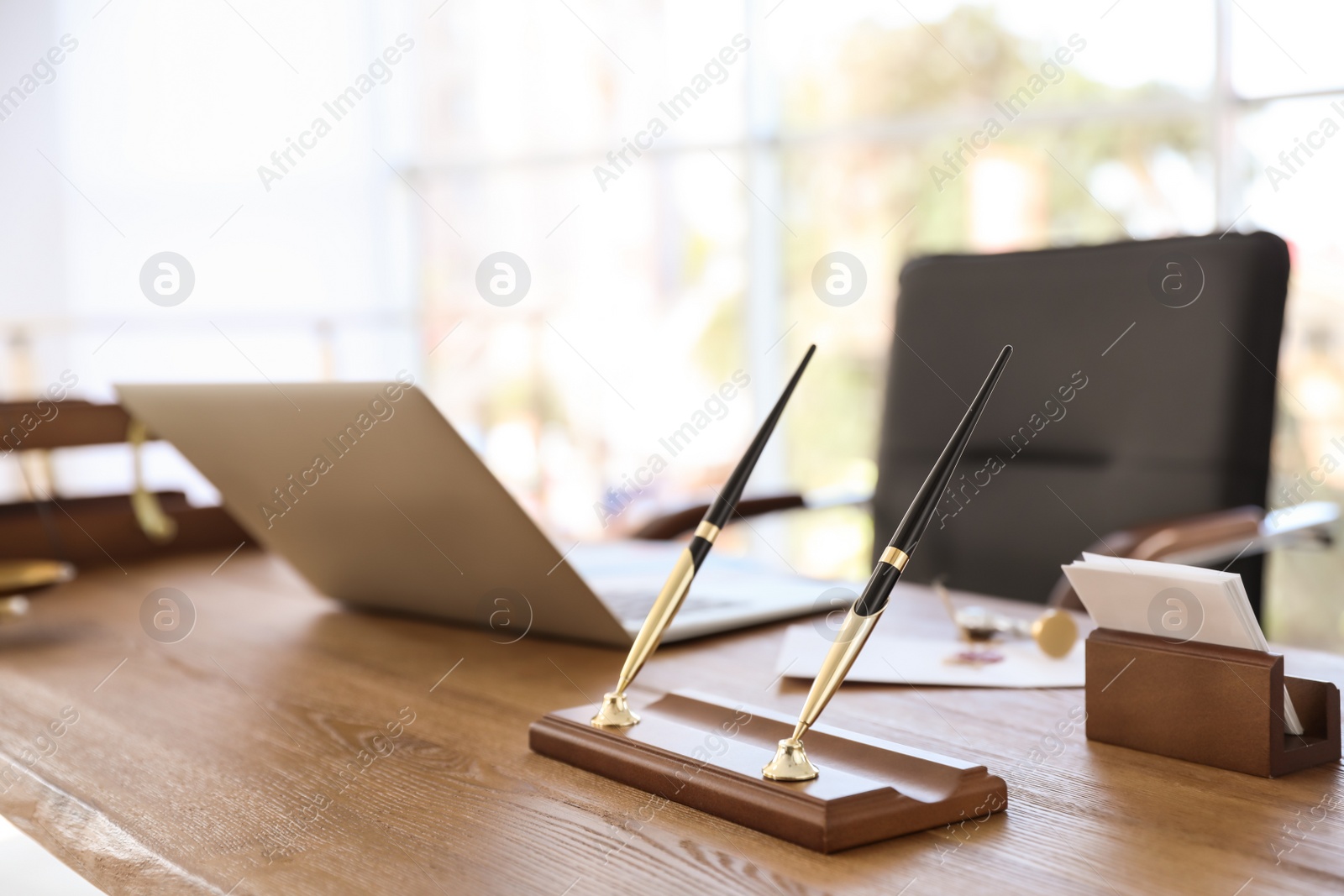 Photo of Office pen holder on desk in notary's office