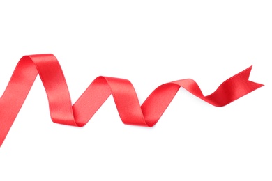 Photo of Simple red ribbon on white background, top view