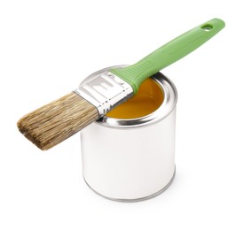 Can of yellow paint with brush isolated on white