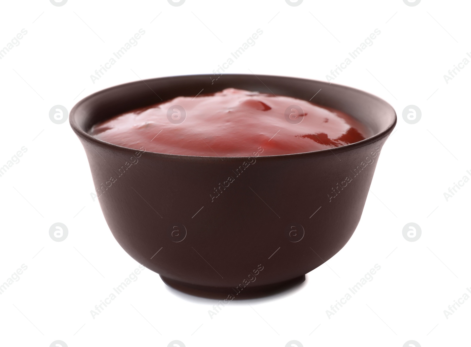 Photo of Bowl of spicy chili sauce on white background