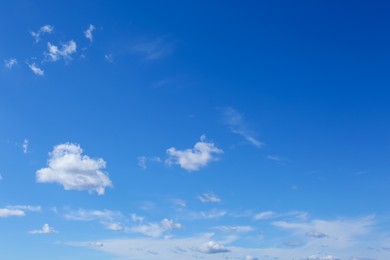 Picturesque blue sky with white clouds on sunny day