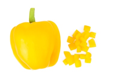 Photo of Whole and diced yellow bell peppers isolated on white, top view