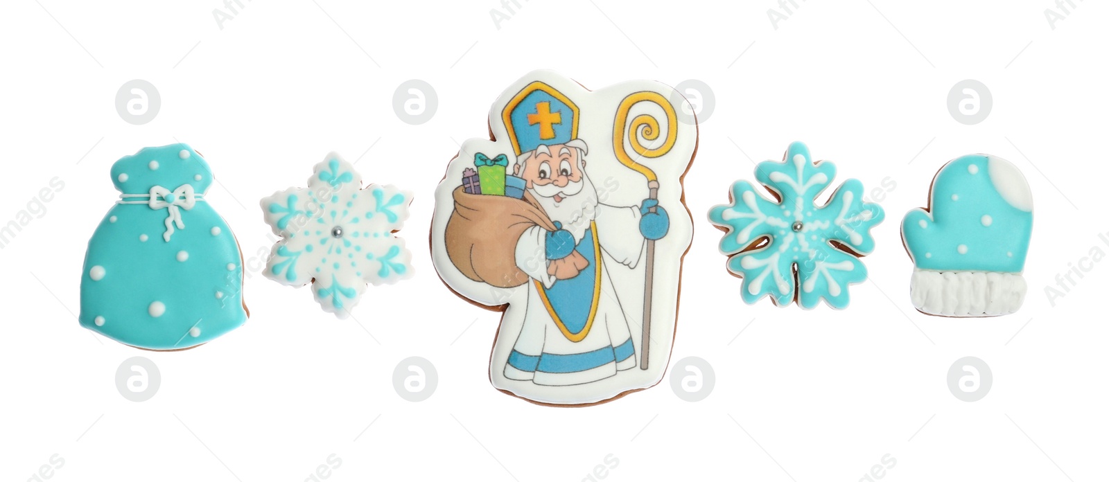 Photo of Tasty gingerbread cookies on white background, top view. St. Nicholas Day celebration