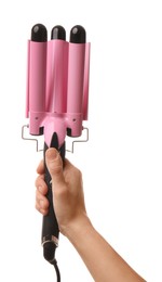 Woman holding modern triple curling iron on white background, closeup
