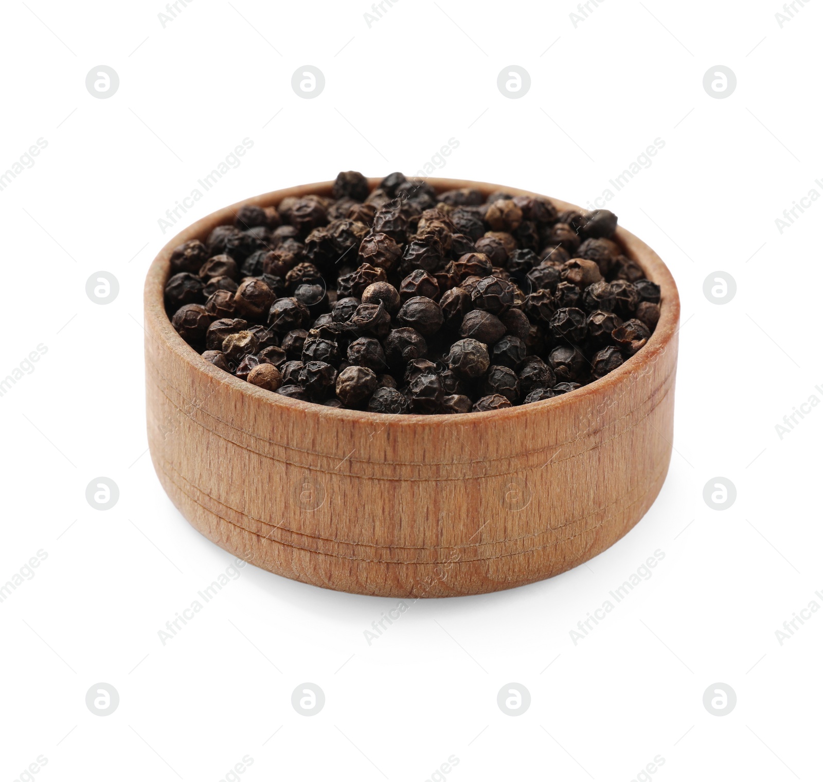 Photo of Aromatic spice. Many black peppercorns in bowl isolated on white