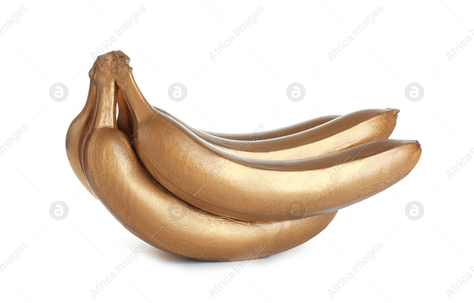 Photo of Bunch of gold painted bananas isolated on white