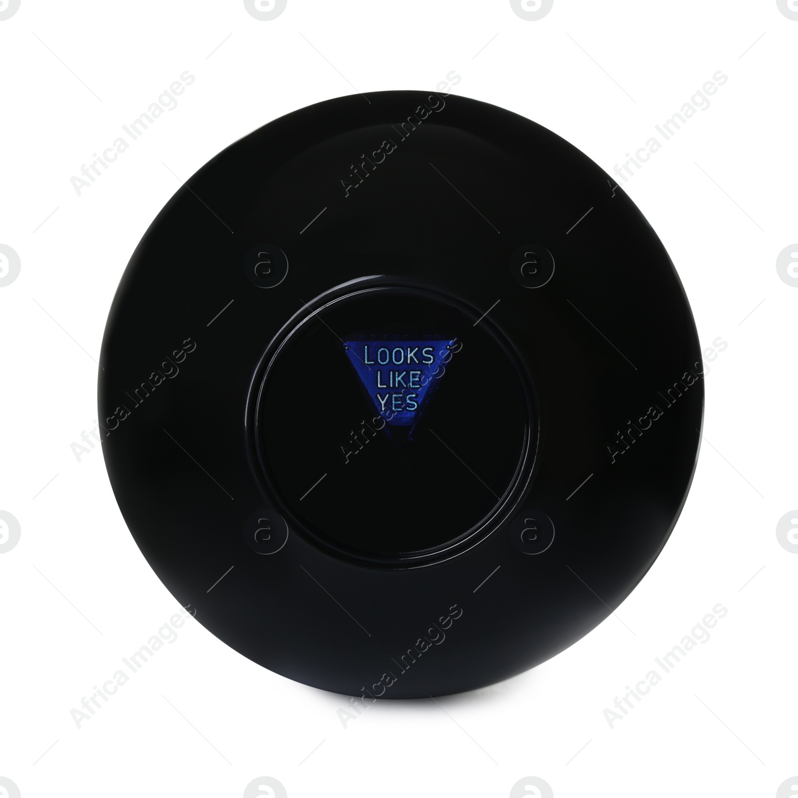 Photo of Magic eight ball with prediction Looks Like Yes isolated on white