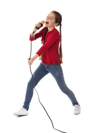 Photo of Cute girl singing in microphone on white background