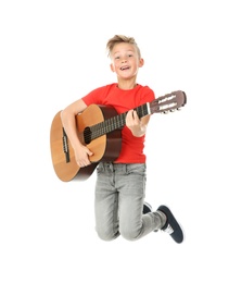 Emotional little boy playing guitar isolated on white