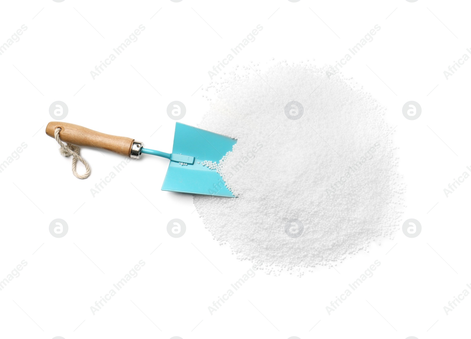 Photo of Pile of granular mineral fertilizer with scoop on white background, top view