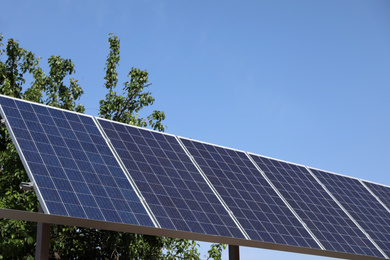 Photo of Modern solar panels outdoors on sunny day