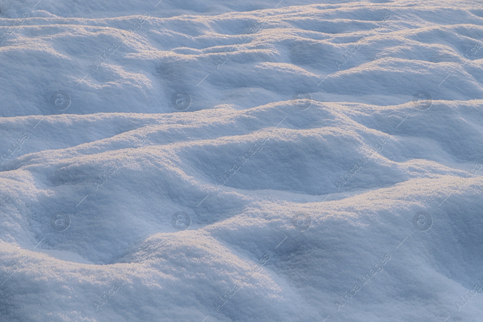 Photo of Beautiful snow as background, closeup view. Winter weather