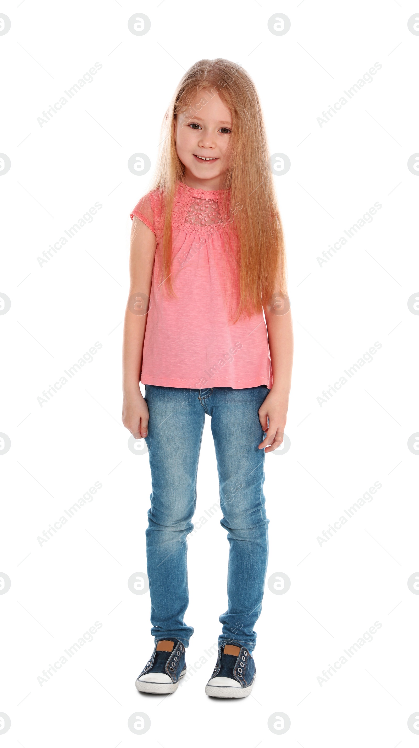 Photo of Full length portrait of cute little girl in casual outfit on white background