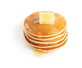 Stack of pancakes with butter and honey on white background