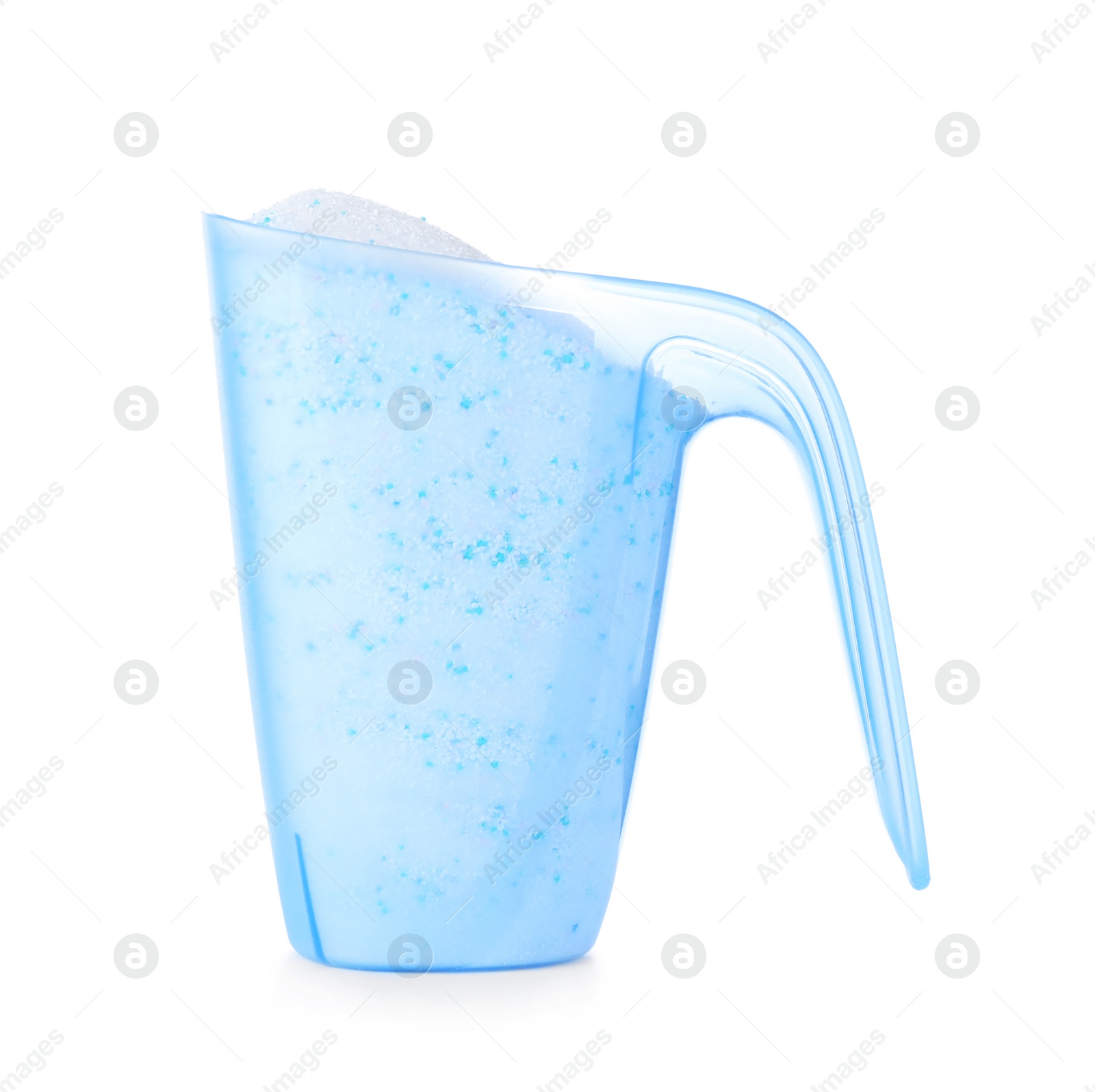 Photo of Laundry detergent in plastic measuring cup on white background