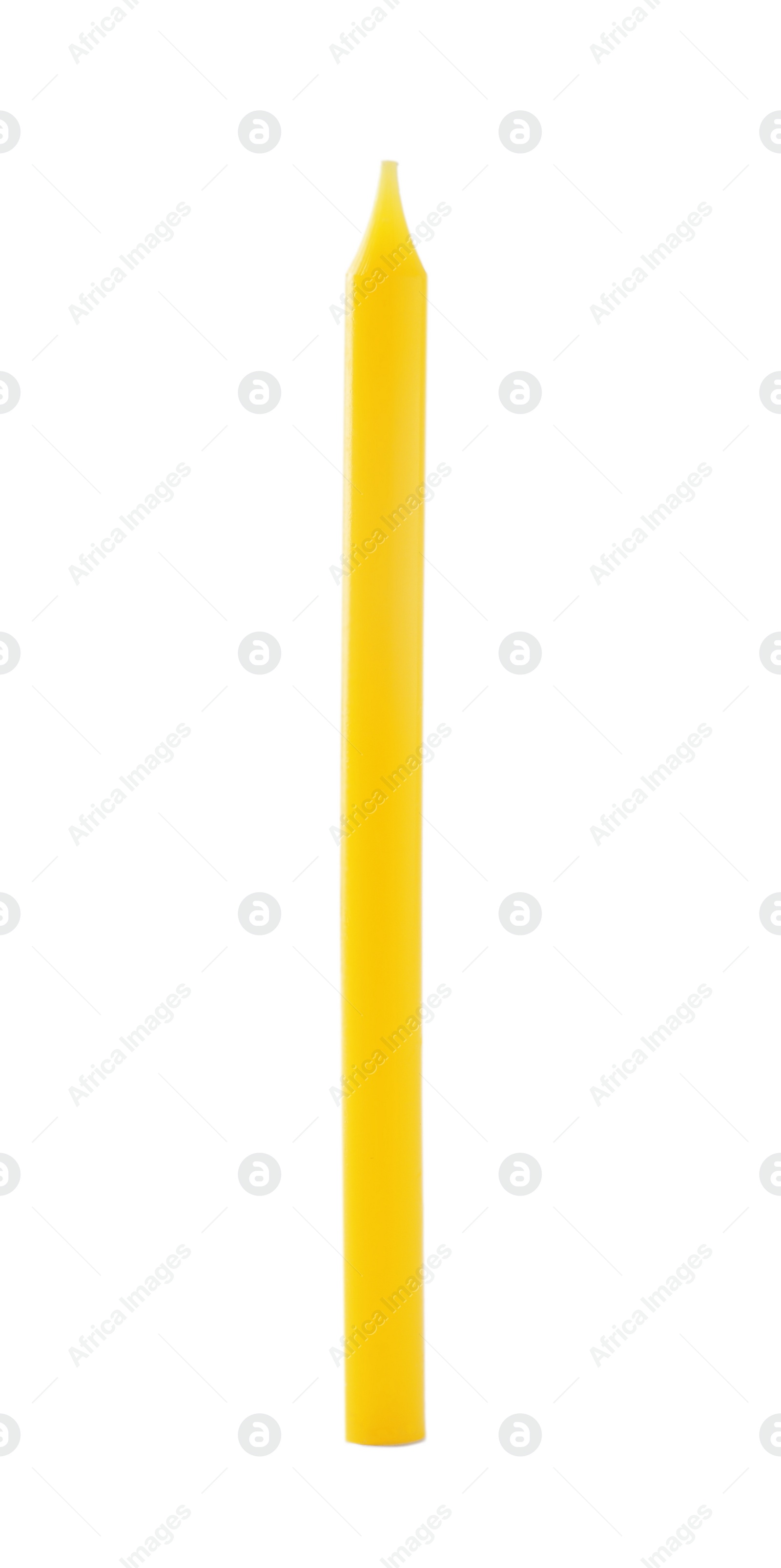 Photo of Thin yellow birthday candle isolated on white